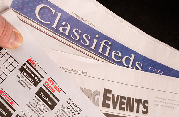 Image of classified ads in the paper.