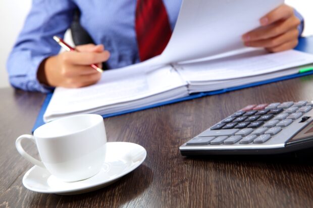 Business woman at a desk.