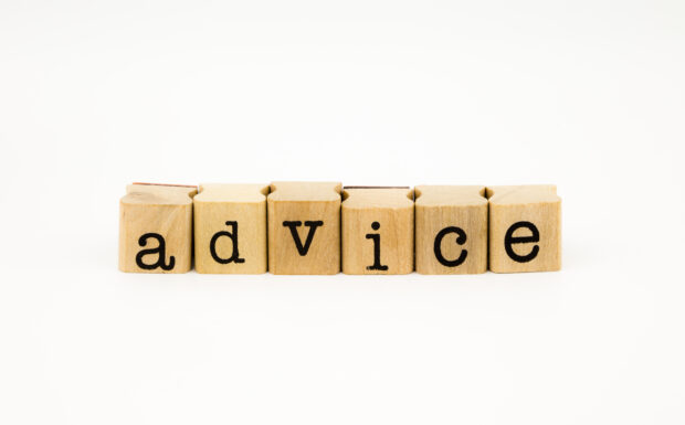 blocks of letters placed together spelling the word 'advice'