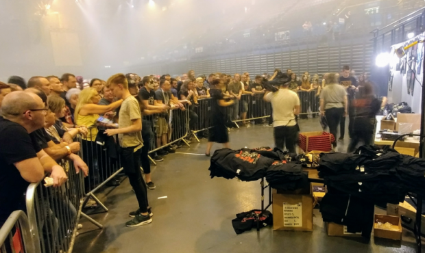 Fans queuing to purchase merchandise at a KISS concert