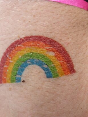 Pride stamp on hand