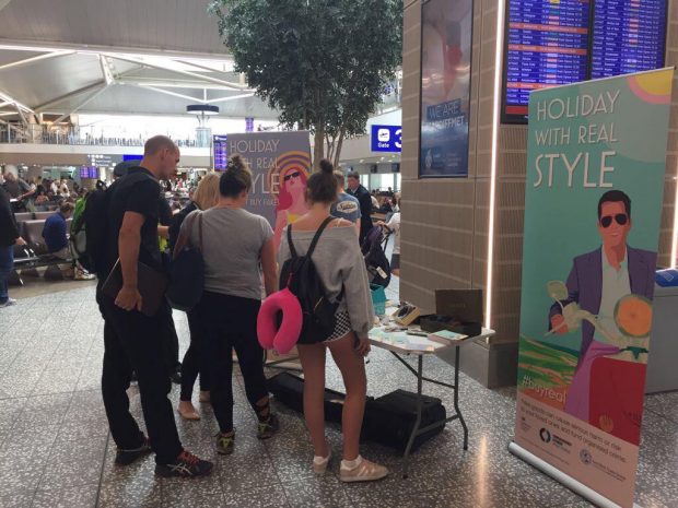 Speaking to travellers at Bristol Airport