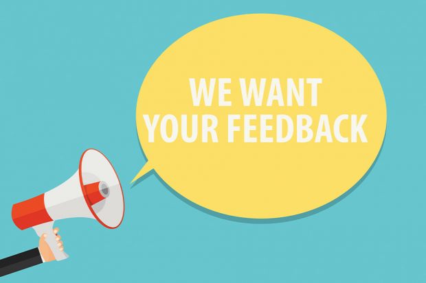 Megaphone with the words 'we want your feedback'