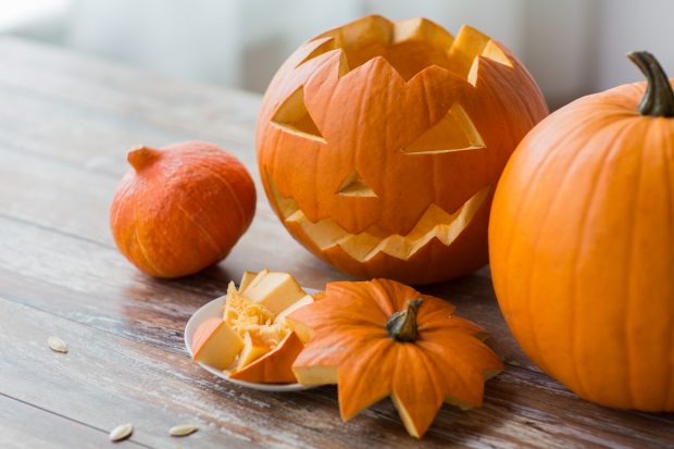 Carved pumpkin on table