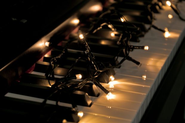 fairy lights on a piano keyboard