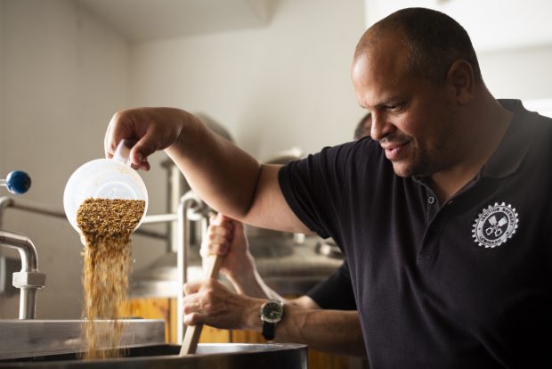 A member of the Ignition team creating the beer