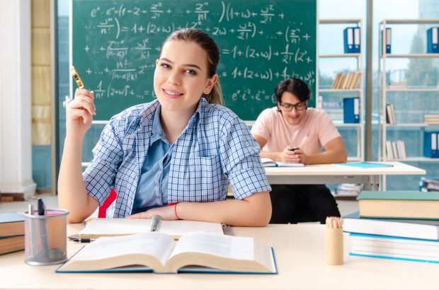 Female mathematics student in the classroom.