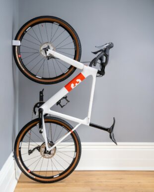 Hornit's CLUG bike rack holding a white bike upright