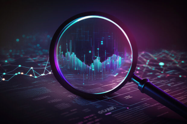 Magnifying glass looking at a graph