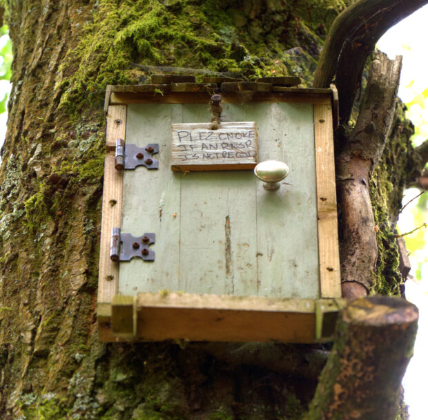 Owl house with caption in the style of Winnie the Pooh