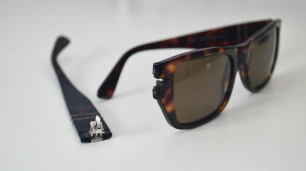 A pair of sunglasses with a broken arm