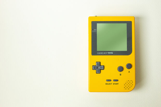 An image of a yellow nintendo gameboy