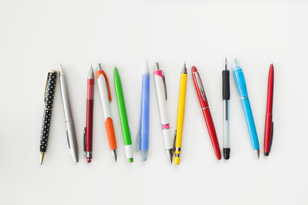 Different colour, type, pen and pencil on white background