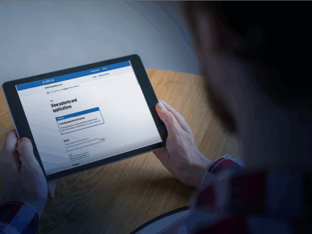 A person using our new IPO accounts on a tablet.