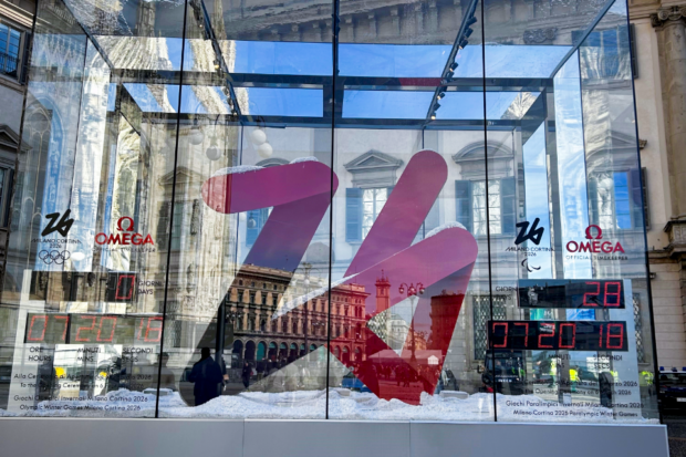 An image of an Omega brand activation - a large snowglobe featuring the Milano Cortina logo, with a countdown to the opening ceremonies of both the Olympic and Paralympic games